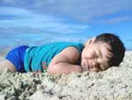 Rodrigo Candia Silveira: "Soninho na praia de Torres. Primeira ida ao litoral de meu filho Rafael, de 11 meses"