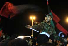 Rebeldes celebram em Benghazi aprovação da ONU de uso da força militar na Líbia - Patrick Baz, AFP
