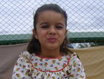 Dilnea Reis Dias: "Maria Eduarda Dias Dorneles, 7 anos. Adora a m�sica tradicionalista, sabe cantar algumas e se realiza quando coloca o mesmo vestido que era meu quando tinha a idade dela"