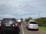 Trnsito lento na RS-407 para acessar Estrada do Mar saindo de Capo. 