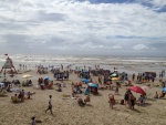 Cu parcialmente nublado em Capo. E o pessoal foi pra praia