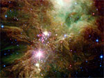 Imagem de telescpio divulgada pela NASA mostra estrelas recm-nascidas, encontradas a cerca de 100 mil anos luz da Terra