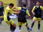 Os jogadores treinaram com chuva nessa tarde
