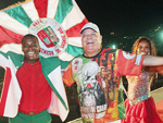 Percio, Diretor de Harmonia e o casal de Mestre-Sala e Porta-Bandeira da Grande Rio