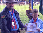 Fabiano Dias de Lima manda a foto do seu filho recebendo o diploma da Ordem dos Cavaleiros do Estado 