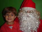 Meu afilhado Gustavo Bones e o Papai Noel no Natal de 2007