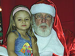 Minha filha Maria Rita com o papai noel no Novo shopping em Novo Hamburgo em 2007