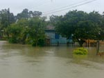 Casa inundada no bairro Vila Zuleima, em Cricima 