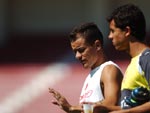 D'Alessandro e Nilmar conversam durante o aquecimento