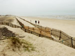 Grades para conteno de areia para fazer as dunas renascerem, em Xangri-l