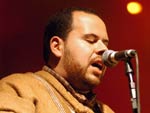 &quot;Parar cantar meu lugar  Falo de fora de lida  Corda de couro estendida  No equilbrio de chinchar&quot;  Composio: Milonga Para Cantar Querncia  1 colocada, melhor melodia e melhor conjunto vocal