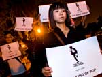 Em Pequim, fs chineses levam cartazes para &quot;O Rei do Pop&quot;