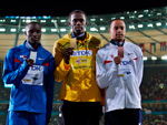 Pdio do 200m: Usain Bolt (c), Alonso Edward (e) e Wallace Spearman (d)