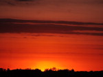P�r-do-sol aberto e colorido em Santa maria