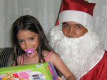 Eu (Paulo Protti) e minha filha Asenate no natal de 2008, realizando o sonho dela de conhecer o papai noel