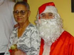 Natal de 2003 em Imb-RS na casa de Paulo e Berenice Dettmer, Minha querida me Ubaldina Vieira matando a saudade de sentar no colo do Papai-Noel (Alexandre Vieira) e acima meu irmo Itamir Vieira, essa histria de noel passa de pai para filho