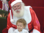 Gabriel Pluijlaar Vargas com o papai noel