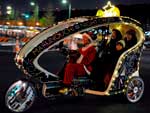 Em Tquio, Papai Noel troca o tren por um velotxi