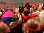 Reprodues de vdeo feito por celular mostram mulher tentando burlar a segurana durante a Missa do Galo. O Papa Bento XVI sofreu queda, mas prosseguiu a missa logo depois