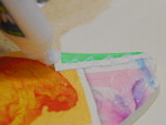 Passo 18: passe o relevo incolor sobre o recorte do guarda-sol, deixe secar.